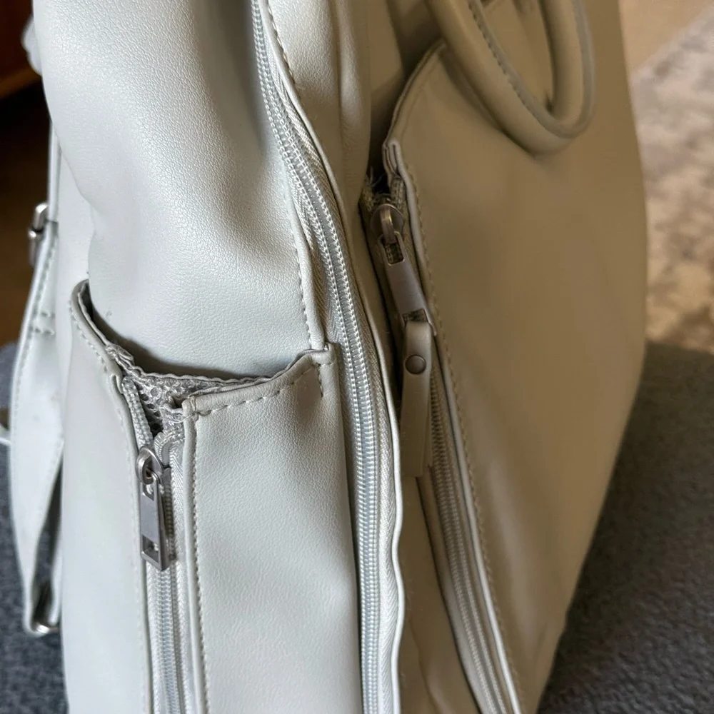 Chic Cream Backpack with Front Pocket
